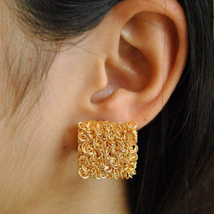 Traditional Kundan earrings in gold-tone, perfect for weddings and festive wear