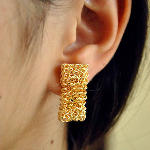 Traditional Kundan earrings in gold-tone, perfect for weddings and festive wear