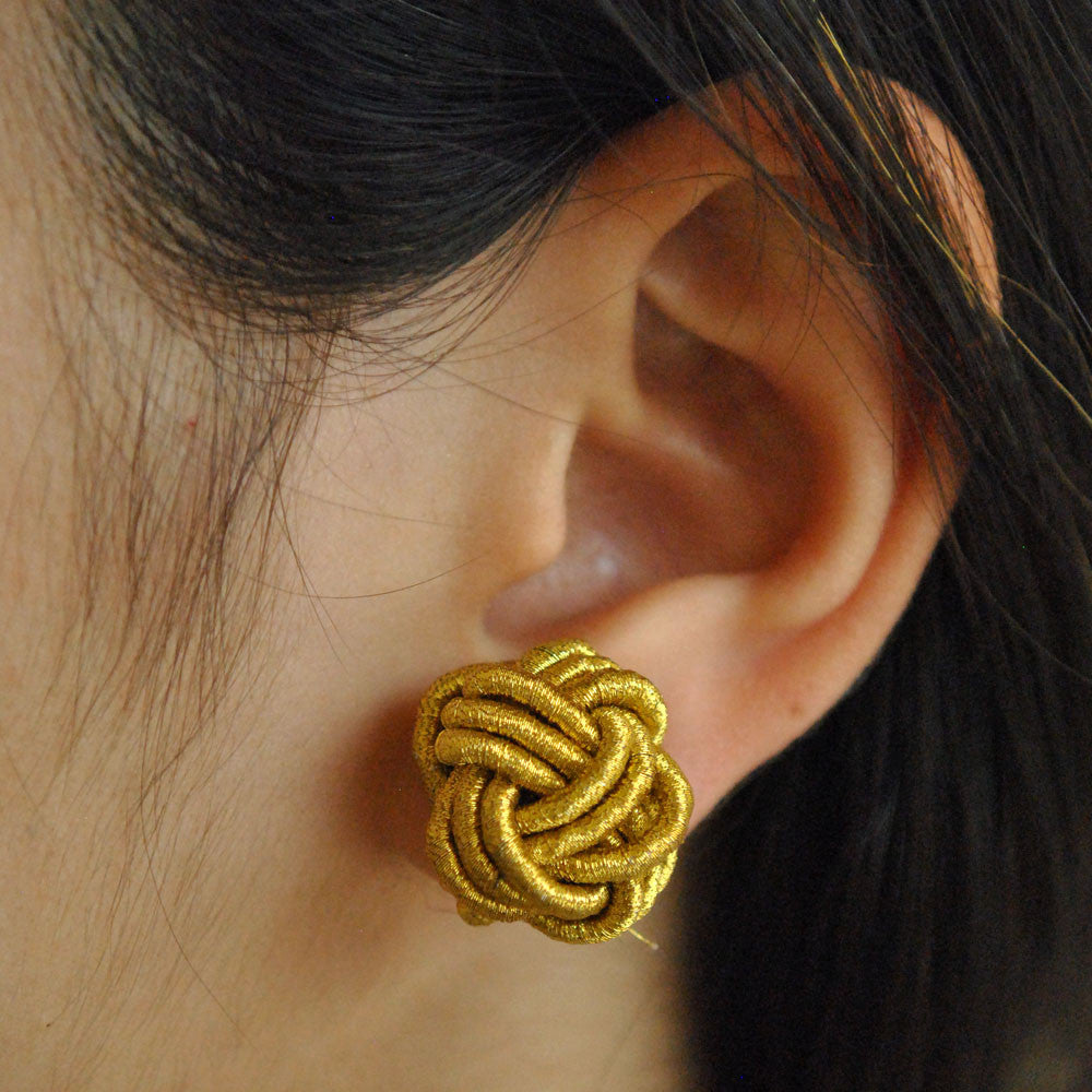 Traditional Kundan earrings in gold-tone, perfect for weddings and festive wear