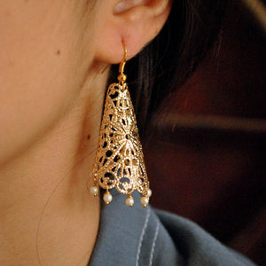 Traditional Kundan earrings in gold-tone, perfect for weddings and festive wear
