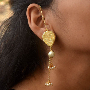 Traditional Kundan earrings in gold-tone, perfect for weddings and festive wear