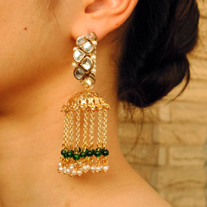 Traditional Kundan earrings in gold-tone, perfect for weddings and festive wear