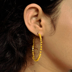 Traditional Kundan earrings in gold-tone, perfect for weddings and festive wear