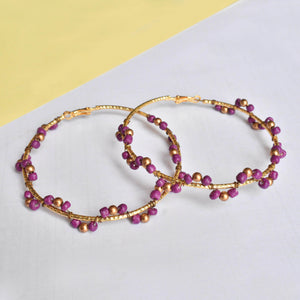 Traditional Kundan earrings in gold-tone, perfect for weddings and festive wear