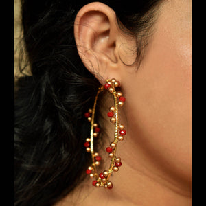 Traditional Kundan earrings in gold-tone, perfect for weddings and festive wear