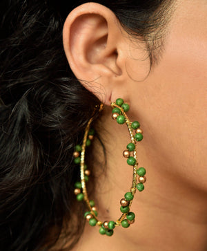 Traditional Kundan earrings in gold-tone, perfect for weddings and festive wear