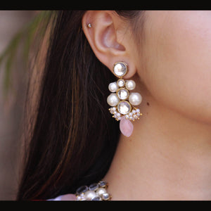 Traditional Kundan earrings in gold-tone, perfect for weddings and festive wear