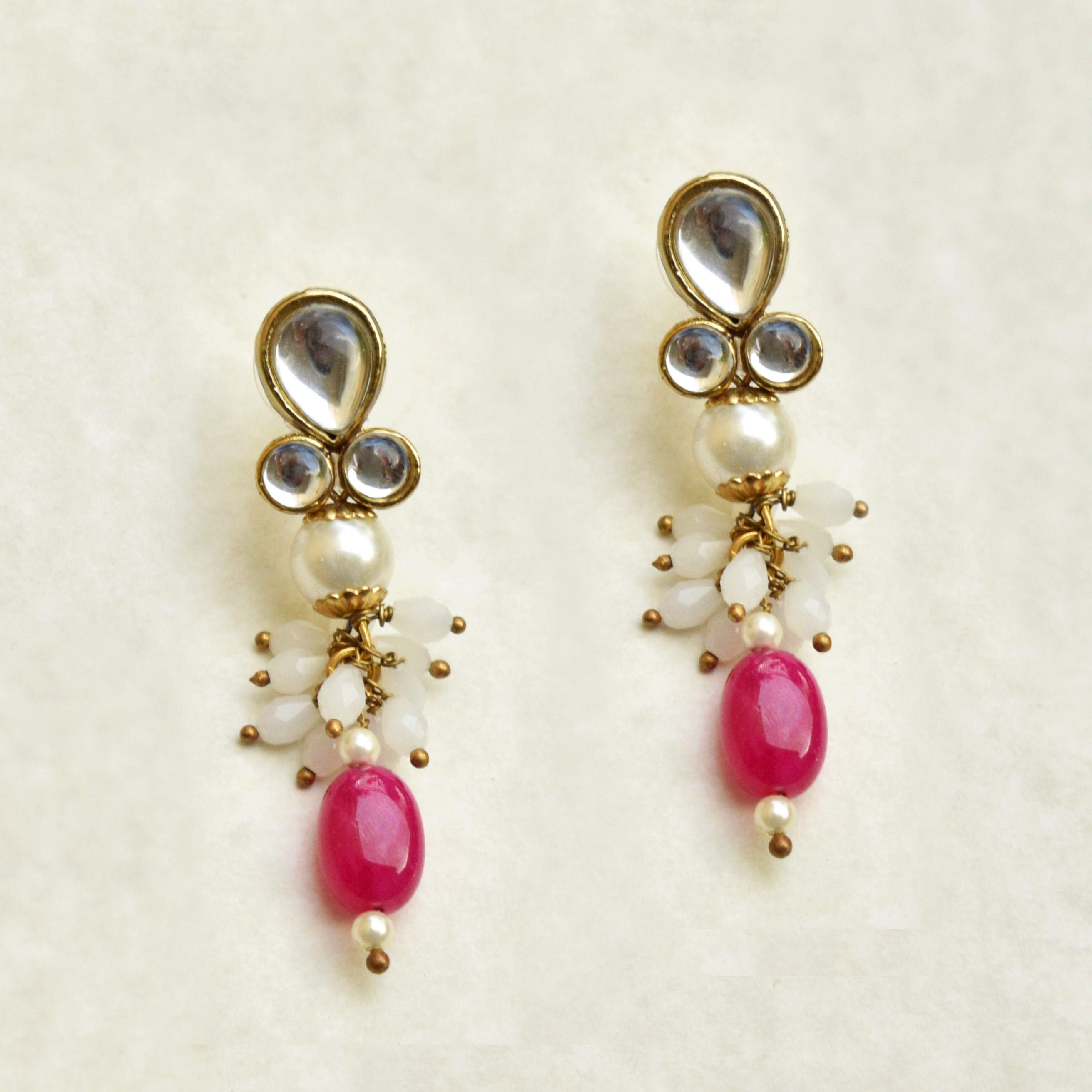 YouBella Red Gold-Plated Leaf-Shaped Stone-Studded Drop Earrings