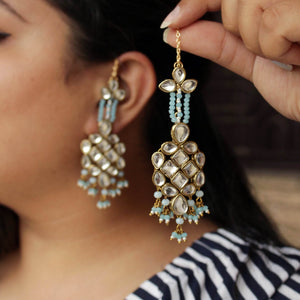 Traditional Kundan earrings in gold-tone, perfect for weddings and festive wear