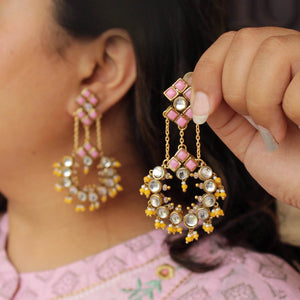 Traditional Kundan earrings in gold-tone, perfect for weddings and festive wear