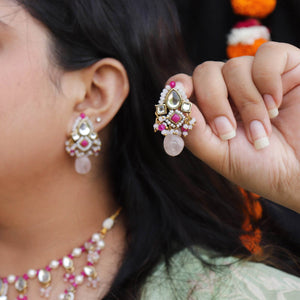Traditional Kundan earrings in gold-tone, perfect for weddings and festive wear