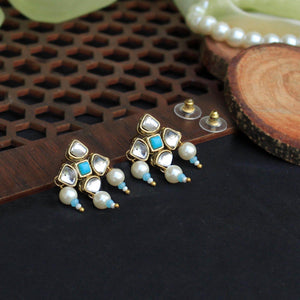 Traditional Kundan earrings in gold-tone, perfect for weddings and festive wear