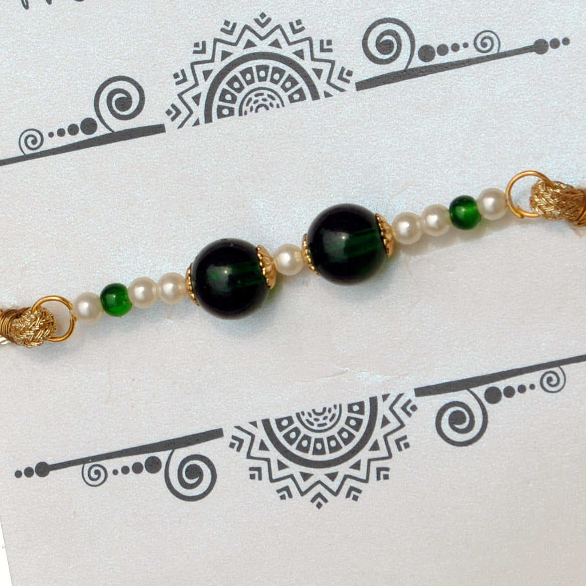 BeAbhika Green Pearl Personalised Initial Rakhi Gold Tone Lightweight Easy To Tie Customised Name Letter Rakhi Available At Best Price In India Online COD Available Send Rakhi To Brother Small Brother Big Brother Younger Brother Send Rakhi Abroad With Roli Chawal Capsules Designer Unqiue Famous 