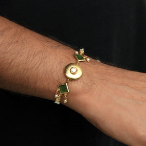 BeAbhika Green Stone Brass Golden Rakhi Gold Tone Lightweight Easy To Tie Rakhi Available At Best Price In India Online COD Available Send Rakhi To Brother Small Brother Big Brother Younger Brother Send Rakhi Abroad With Roli Chawal Capsules Designer Unqiue Famous 