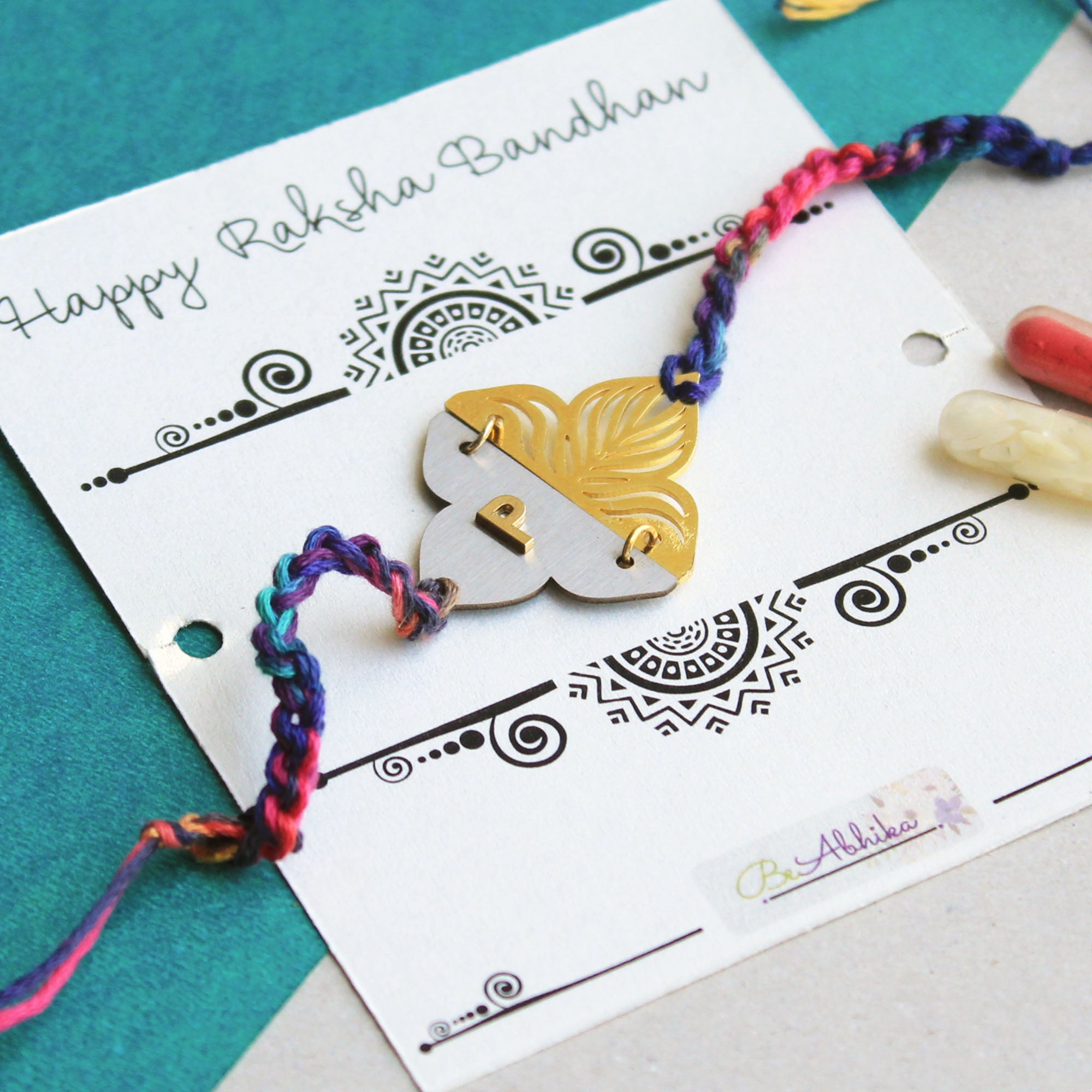 BeAbhika Personalised Name Initial Rakhi Customised Name Letter Alphabet Rakhi Lightweight Easy To Tie Rakhi Available At Best Price In India Online COD Available Send Rakhi To Brother Small Brother Big Brother Younger Brother Send Rakhi Abroad With Roli Chawal Capsules Designer Unqiue Famous 