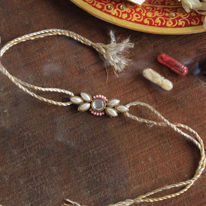BeAbhika White Pearl Rakhi Gold Tone Pink Beads Lightweight Easy To Tie Rakhi Available At Best Price In India Online COD Available Send Rakhi To Brother For Small Brother Big Brother Younger Brother Send Rakhi Abroad With Roli Chawal Capsules Designer Unqiue Famous 