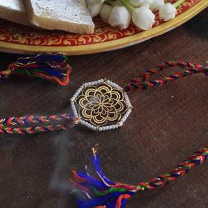 BeAbhika Gold Tone Floral Design White Beads Religious Floral Mandala Rakhi Designer Unqiue Famous Rakhi Lightweight Easy To Tie Rakhi Available At Best Price In India Online COD Available Send Rakhi To Brother Small Brother Big Brother Younger Brother Send Rakhi Abroad With Roli Chawal Capsules