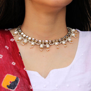 Kundan choker set in gold-tone with matching earrings and long bridal necklace, perfect for wedding functions , festive and bridal wear