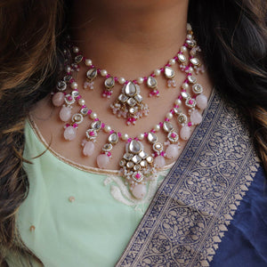 Kundan choker set in gold-tone with matching earrings and long bridal necklace, perfect for wedding functions , festive and bridal wear