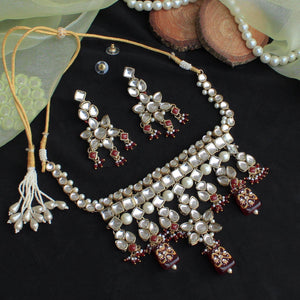Kundan choker set in gold-tone with matching earrings and long bridal necklace, perfect for wedding functions , festive and bridal wear