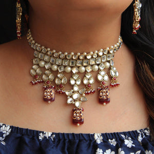 Kundan choker set in gold-tone with matching earrings and long bridal necklace, perfect for wedding functions , festive and bridal wear