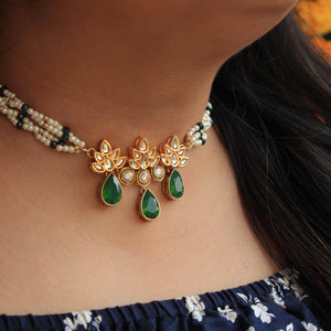 Kundan choker set in gold-tone with matching earrings and long bridal necklace, perfect for wedding functions , festive and bridal wear