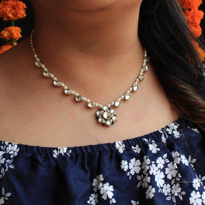 Kundan choker set in gold-tone with matching earrings and long bridal necklace, perfect for wedding functions , festive and bridal wear