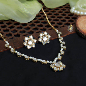 Kundan choker set in gold-tone with matching earrings and long bridal necklace, perfect for wedding functions , festive and bridal wear