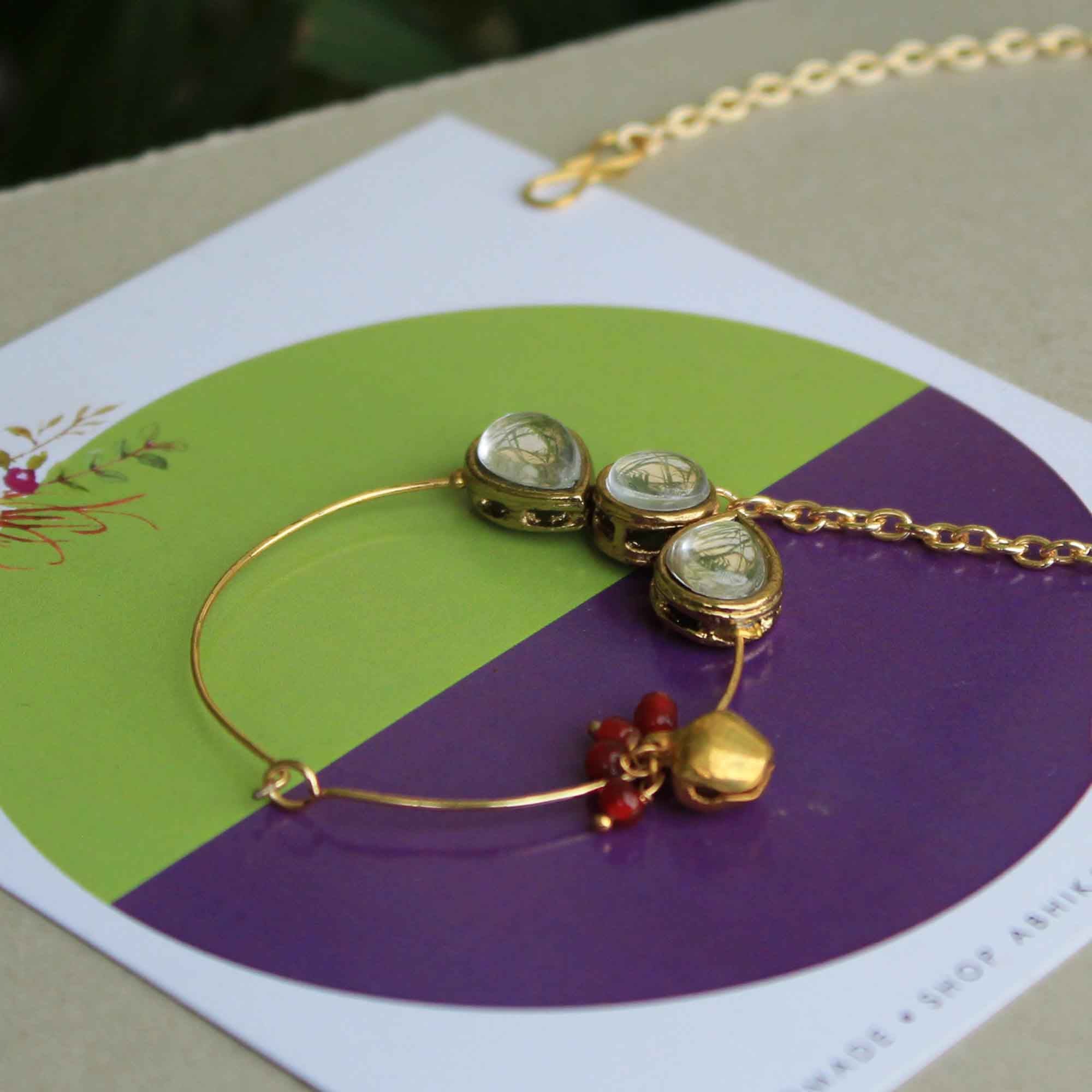 Traditional Indian bridal nath with kundan stones, green beads, and pearl hair chain Indian Nathiya Nathani Nose Ring