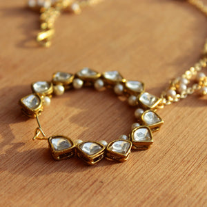 Traditional Indian bridal nath with kundan stones, green beads, and pearl hair chain Indian Nathiya Nathani Nose Ring