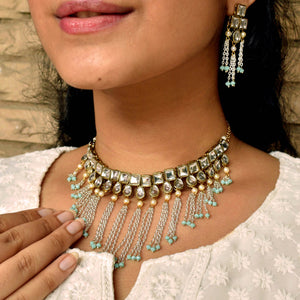 Kundan choker set in gold-tone with matching earrings and long bridal necklace, perfect for wedding functions , festive and bridal wear