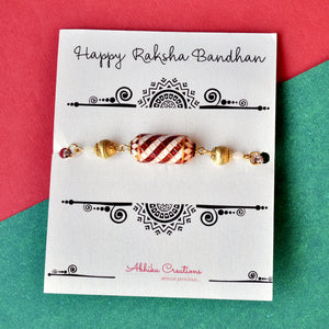 Enamel Damroo Rakhi