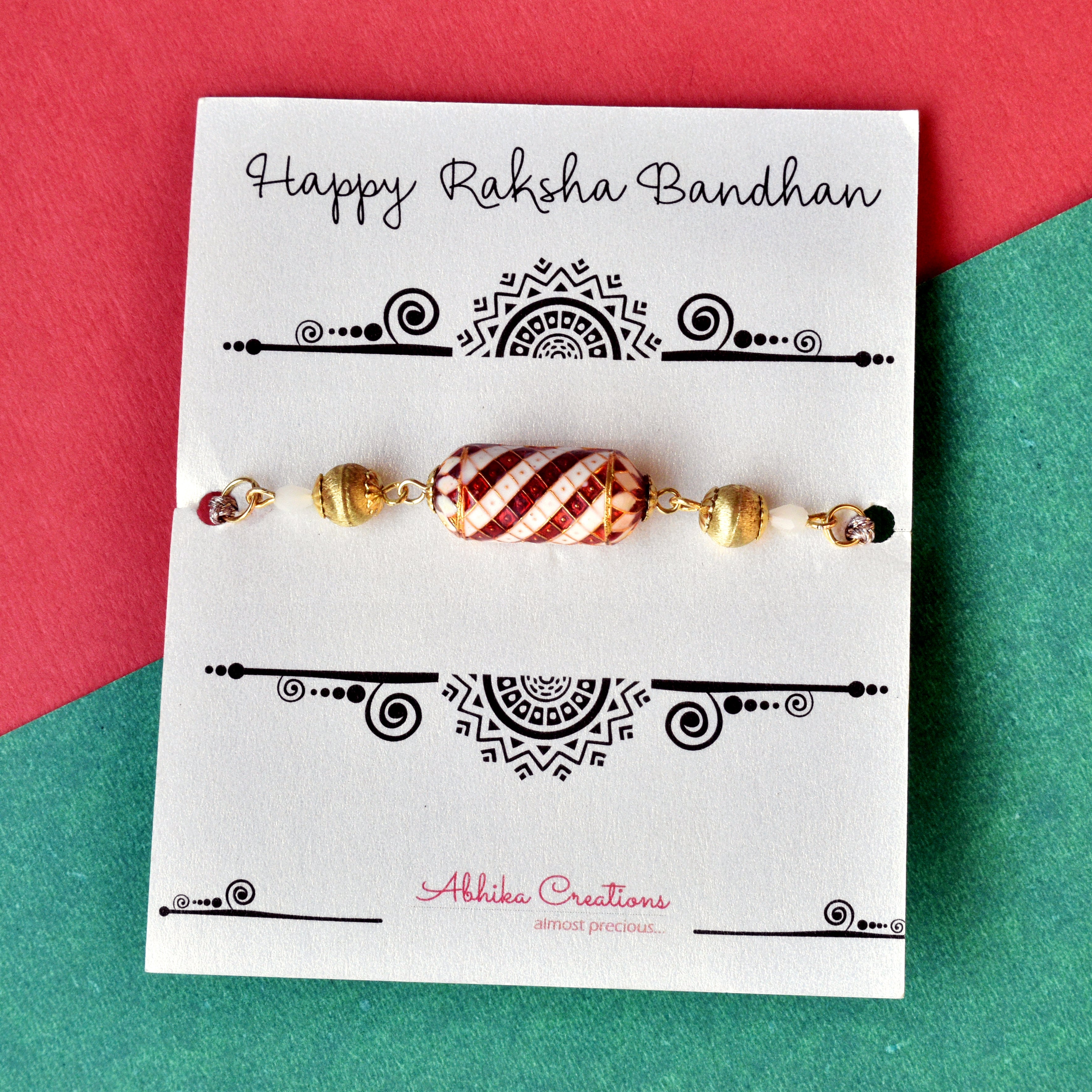 Enamel Damroo Rakhi