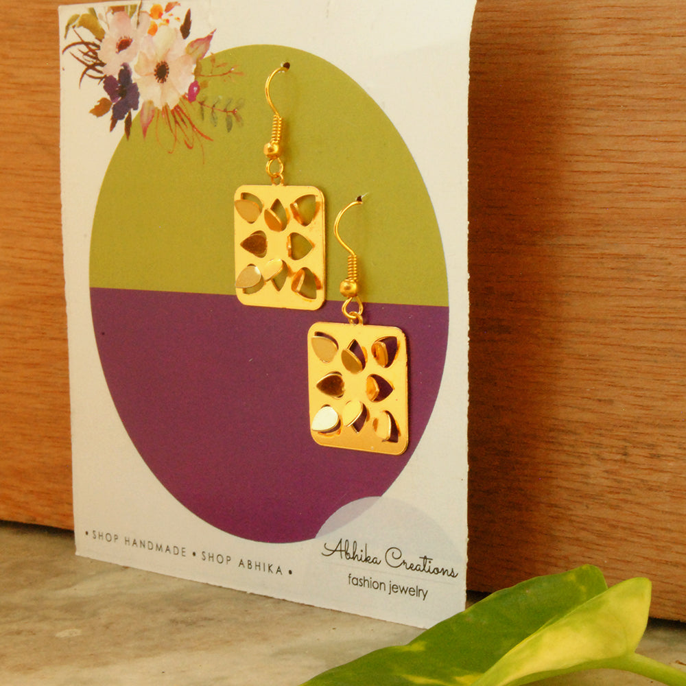 Traditional Kundan earrings in gold-tone, perfect for weddings and festive wear