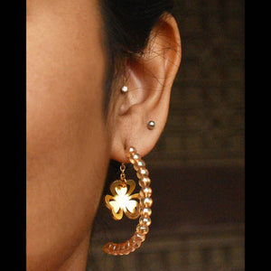 Traditional Kundan earrings in gold-tone, perfect for weddings and festive wear