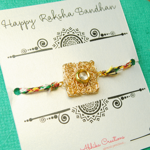 BeAbhika White Pearl Rakhi Gold Tone Lightweight Easy To Tie Rakhi Available At Best Price In India Online COD Available Send Rakhi To Brother For Small Brother Big Brother Younger Brother Send Rakhi Abroad With Roli Chawal Capsules Designer Unqiue Famous 