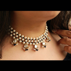 Kundan choker set in gold-tone with matching earrings and long bridal necklace, perfect for wedding functions , festive and bridal wear