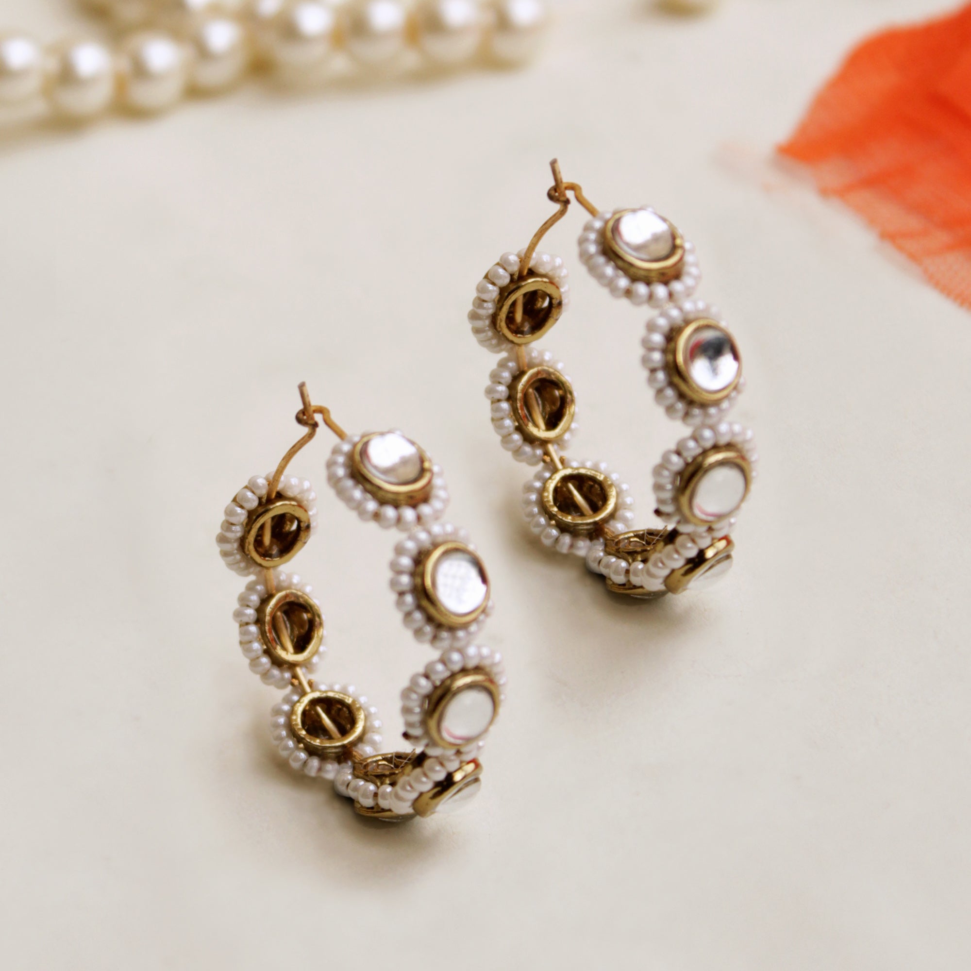 white pearls hoops earrings