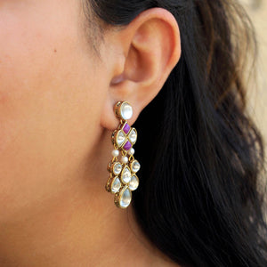 Traditional Kundan earrings in gold-tone, perfect for weddings and festive wear