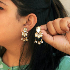 Traditional Kundan earrings in gold-tone, perfect for weddings and festive wear