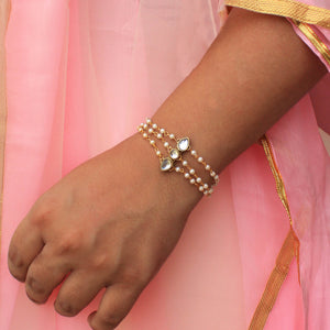 BeAbhika Kundan Gold Tone White Pearls Bhabhi Lumba Bracelet Style Rakhi Adjustable Bracelet Style Lumba Bracelet For Sister In Law Sister Rakhi Designer Unique Bhabhi Rakhi Lumba Available In India Best Price Online Send Rakhi To Bhai Brother